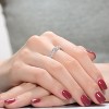 Guili Rhodium-Plated Sterling Silver Eternity Ring with Clear Round CZ and a Curved Design, an exquisite touch of sophistication, sizes 6-8. - 3 of 3