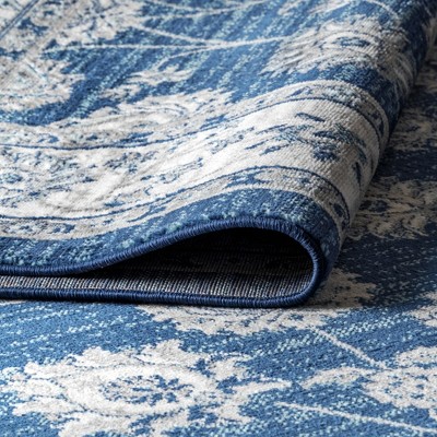 Ivory and Blue Floral Synthetic 4' x 6' Area Rug