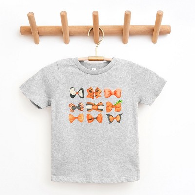 The Juniper Shop Coquette Girl Halloween Bow Chart Toddler Short Sleeve Tee