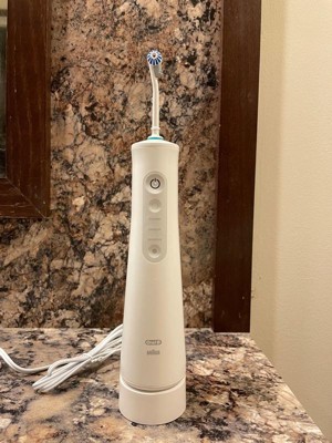 Philips Sonicare Cordless Water Flosser w/2 Nozzle Tips & $10