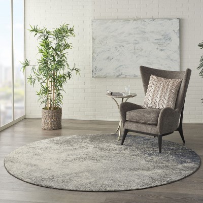 Large Round Gray and Ivory Synthetic Traditional Rug