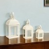 HomeRoots Set of Three Ivory Distressed Glass And Metal Floor Lantern Candle Holders - 2 of 4