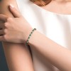 EVERLY JEWELRY | Yellow Plated Sterling Silver 0.02 CT Diamond TW And 7 3/4 CT TGW Created Emerald Bracelet, 7.25-inch - 3 of 4