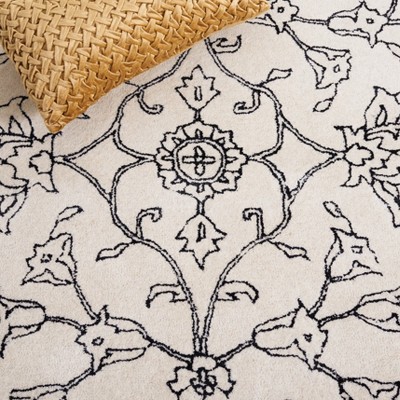 Ivory and Black Floral Hand-Tufted Wool Area Rug 4' x 6'