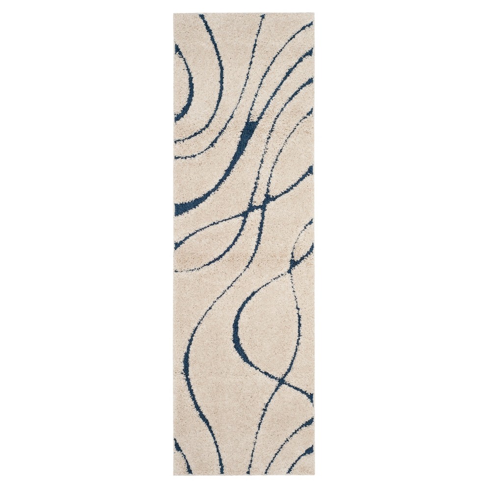 2'3inx7' Runner Cream/Blue Swirl Loomed - Safavieh