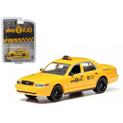 Ford Crown Victoria Yellow "NYC Taxi" (New York City) 1/64 Diecast Model Car by Greenlight