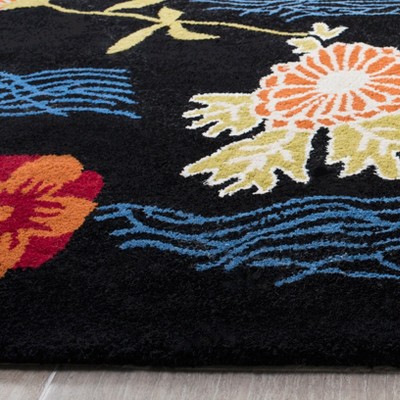 Black and Multicolor Hand-Tufted Wool 4' x 6' Area Rug
