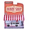 1985 GMC Suburban 2500 "NYC Transit Police Department" White with Blue Stripes and Figure 1/64 Diecast Model Car by Greenlight - 3 of 3