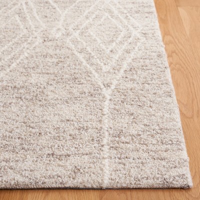 Ivory Wool 4' x 6' Handmade Tufted Area Rug