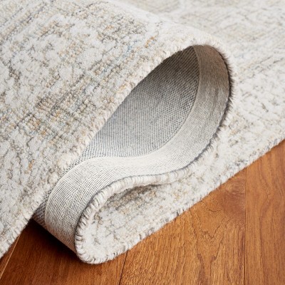 Ivory Tufted Wool 4' x 6' Rectangular Area Rug