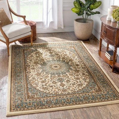 Ivory and Blue Medallion 5' x 7' Synthetic Area Rug