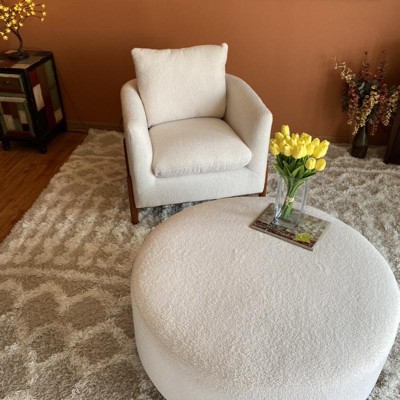 Elroy sherpa round ottoman on sale with wood legs cream