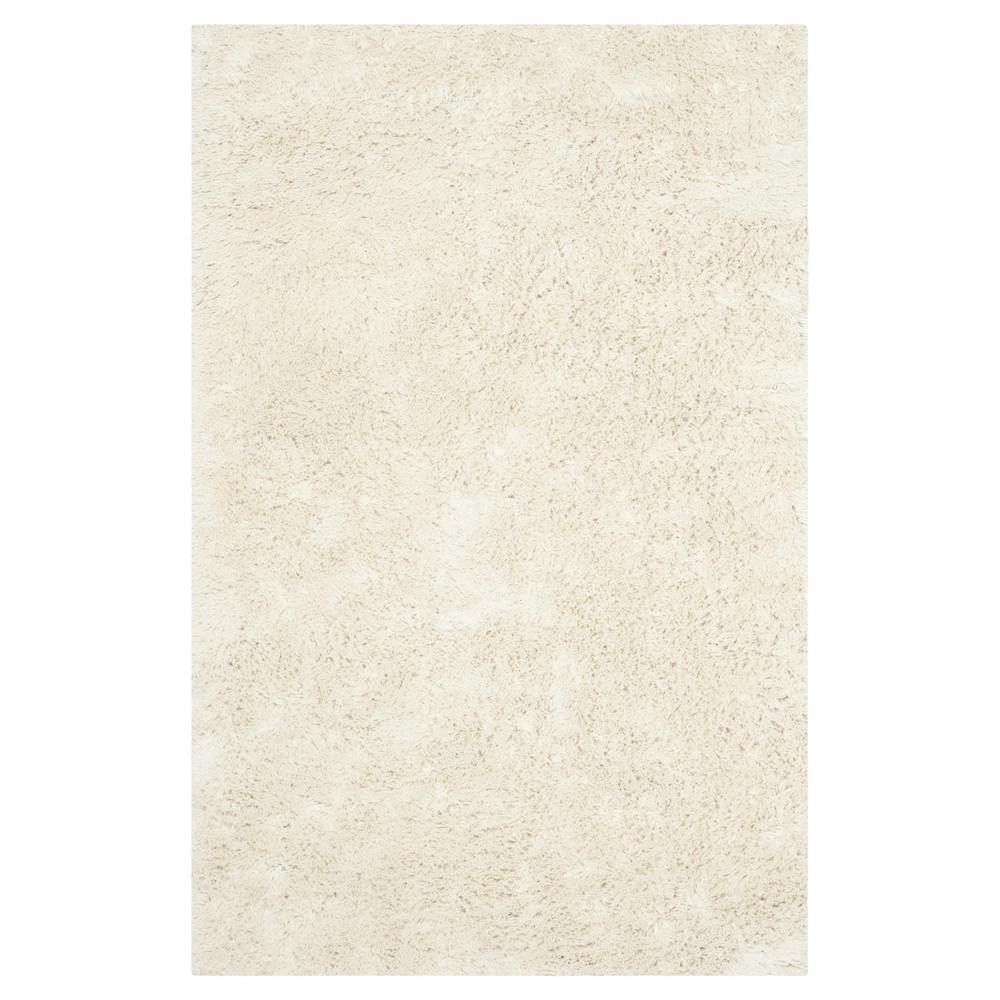 Ivory Solid Tufted Accent Rug - (3'x5') - Safavieh