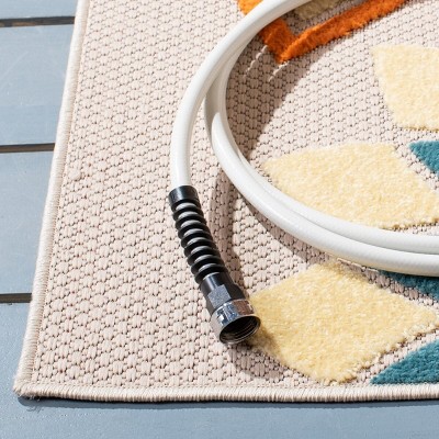 Ivory and Orange Floral Rectangular Synthetic Rug, 3' x 5'