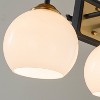 ALOADECOR 3-Light W22" Modern Elegant Brass And Black Bathrooom Vanity Light with Round Milk White Glass Shades - 4 of 4
