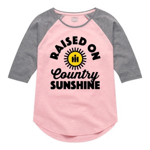 Girls' - Country Casuals - Raised On Country Sunshine Shirt Tail Raglan Graphic T-shirt - 1 of 4