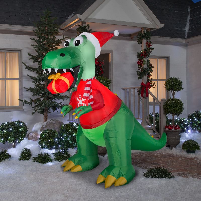 Gemmy Christmas Airblown Inflatable T Rex w/Gift, 7.5 ft Tall, Green, 2 of 3
