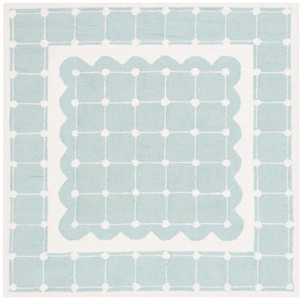 Safavieh Kids SFK927 Hand Tufted Indoor Rug - Safavieh - 1 of 4