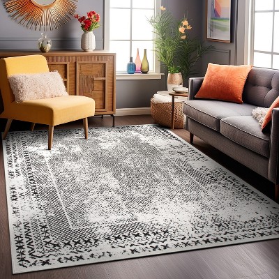 Black Geometric 5' x 7' Synthetic Easy Care Area Rug