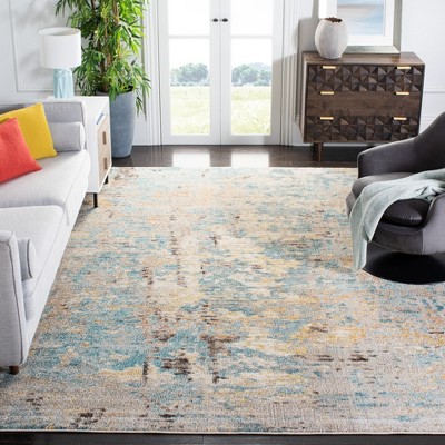 Gray and Blue Abstract 9' x 12' Synthetic Area Rug