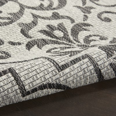 Ivory & Charcoal Round Synthetic Indoor/Outdoor Area Rug