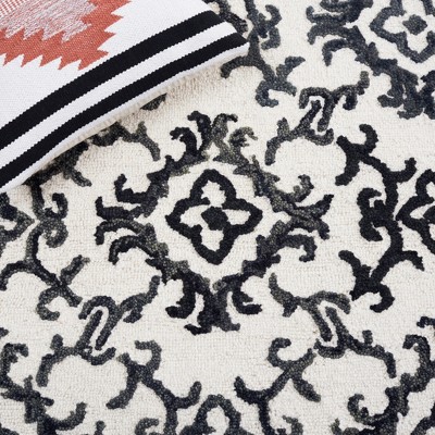 Handmade Black and Ivory Wool Floral 8' x 10' Rug