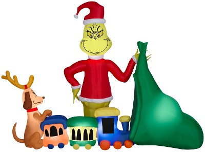 Grinch Christmas Airblown Inflatable Putting Train in Santa Sack Scene Dr. Seuss, 6.5 ft Tall