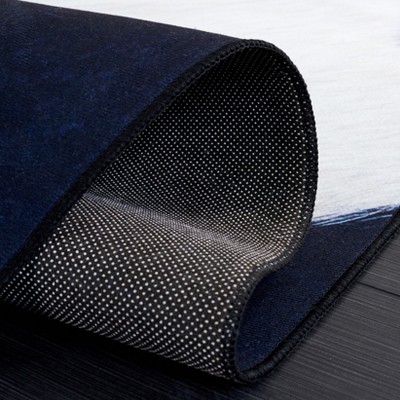 Ivory and Dark Blue Faux Cowhide Fur 5' x 8' Area Rug