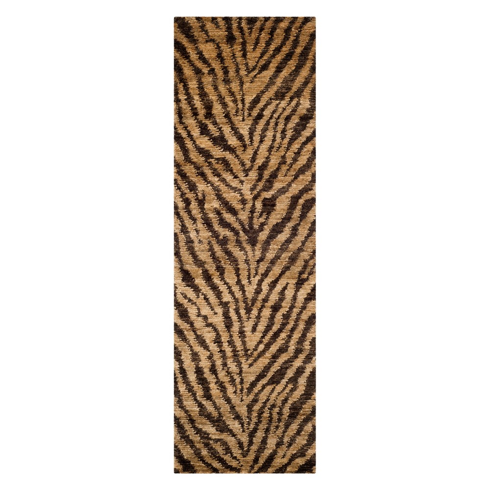 2'6 x8' Runner Tiger Print Natural/Black - Safavieh The Corfu Rug Collection elevates this trendy look in restyled geometric art patterns and a blend of natural fiber and wool yarns. These eco-friendly rugs are awash captivating colors and hand knotted to create rich textures and a remarkable feel underfoot. Safavieh brings fashion excitement to the eco-friendly rug category with the Corfu collection's unique patterns, ribbed textures and remarkable hand. Corfu rugs are washed to soften the yarn, and then brushed to a lustrous sheen to accentuate the boho-chic vibe found throughout this collection. Color: One Color. Pattern: 868Tiger Print.