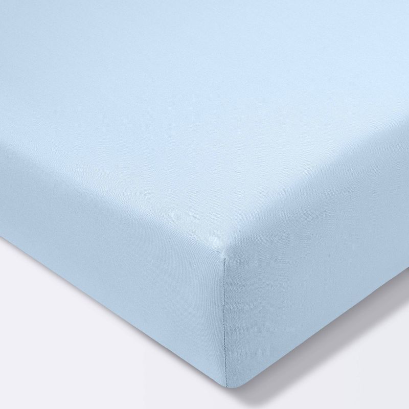 Fitted Crib Sheet Solid - Cloud Island&#8482; Light Blue, 1 of 9