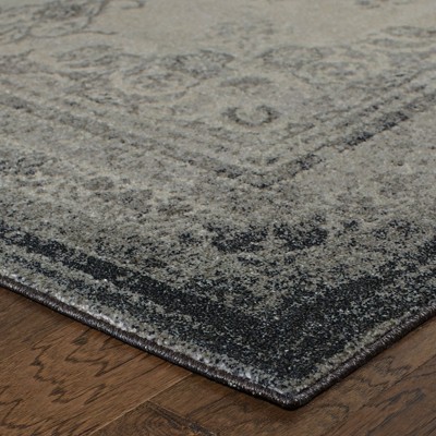 Ivory Rectangular Stain-Resistant Synthetic Area Rug, 6'7" x 9'6"