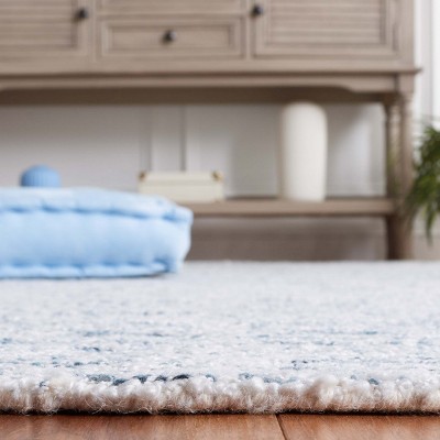 Ebony Light Blue Wool and Synthetic Hand Tufted Area Rug