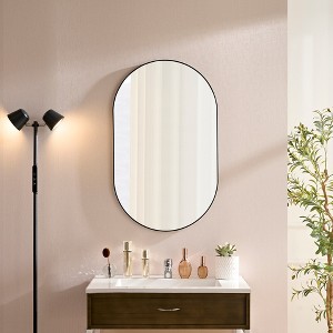 FONTOI Black Metal Oval Wall Mirror, Contemporary Decorative Accent Mirror with Sleek Design for Bathroom Bedroom or Living Room, Black, 36"*22"*0.75" - 1 of 4