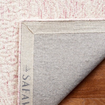 Ebony 5' x 8' Pink and Ivory Hand Tufted Wool Area Rug