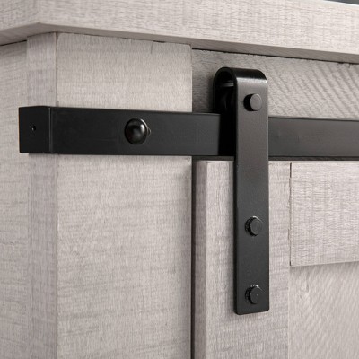 Saw Cut Off-White Compact TV Stand with Barn Door Cabinet