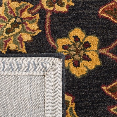 Elegant Jaipur Heritage Black and Gold 5' x 8' Wool Area Rug