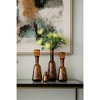 HomeRoots Set of Three Amber Abstract Swirl Glass Decorative Bottles With Stoppers - 2 of 2