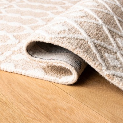 Ivory Handmade Tufted Wool 4' x 6' Area Rug