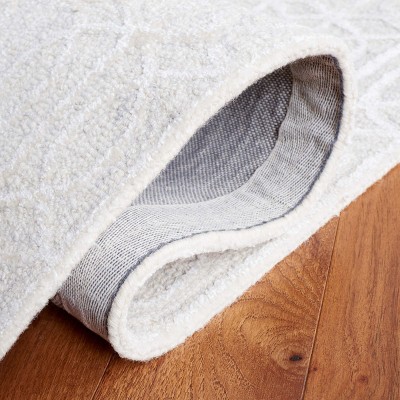 Beige and Ivory Tufted Wool and Viscose 6' x 9' Area Rug