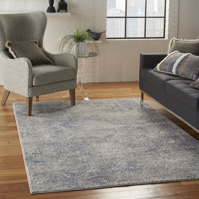 Ivory Elegance 5'3" x 7'3" Synthetic Vintage Persian Rug