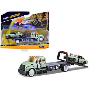 International DuraStar Flatbed Truck & 1988 Ford Mustang LX Light Green Met. w/Stripes & Graphics 1/64 Diecast Models by Maisto - 1 of 3