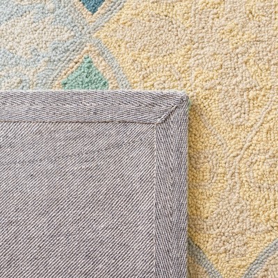 Handmade Ivory Wool Square Area Rug with Floral Design