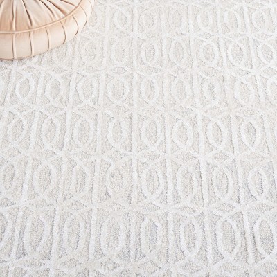 Beige and Ivory Tufted Wool and Viscose 6' x 9' Area Rug
