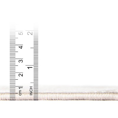 Beige 6' x 9' Rectangular Easy-Care Synthetic Area Rug