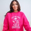 Simply Sage Market Women's Graphic Sweatshirt One More Chapter Skeleton - 2 of 3