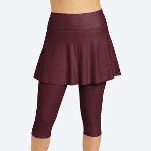 Calypsa Women's Plus Size Chlorine Resistant High Waisted Flared Swim Skort With Attached Capri Leggings - 1 of 3