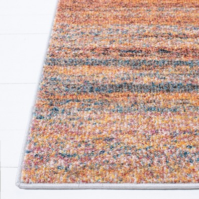 Rust and Blue Abstract Rectangular Synthetic Area Rug