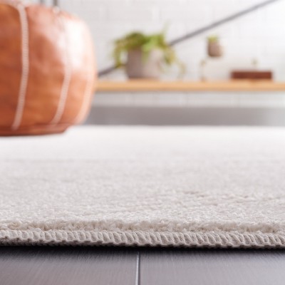 Ivory Geometric Pattern Power Loomed Area Rug 5'3" x 7'6"