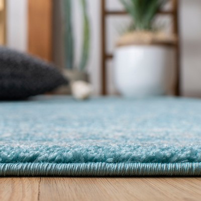 Turquoise and Ivory Hand-knotted Synthetic 8' x 10' Area Rug