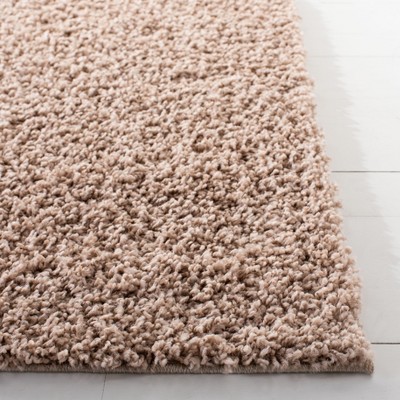 Beige 5'3" x 7'6" Synthetic Shag Area Rug